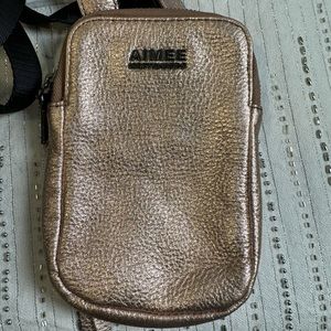 Aimee gold metallic mini crossbody bag.